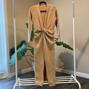 Soft light weight sweater dress with middle split!